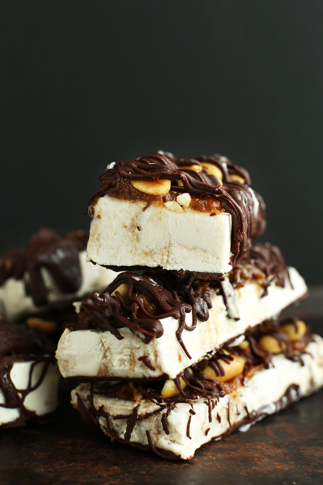 Stack of our delicious gluten-free vegan Ice Cream Snickers Bar recipe