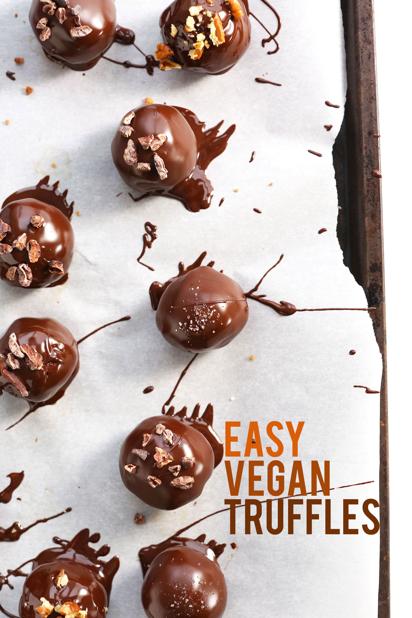 Easy homemade Vegan Chocolate Truffles on a parchment-lined baking sheet