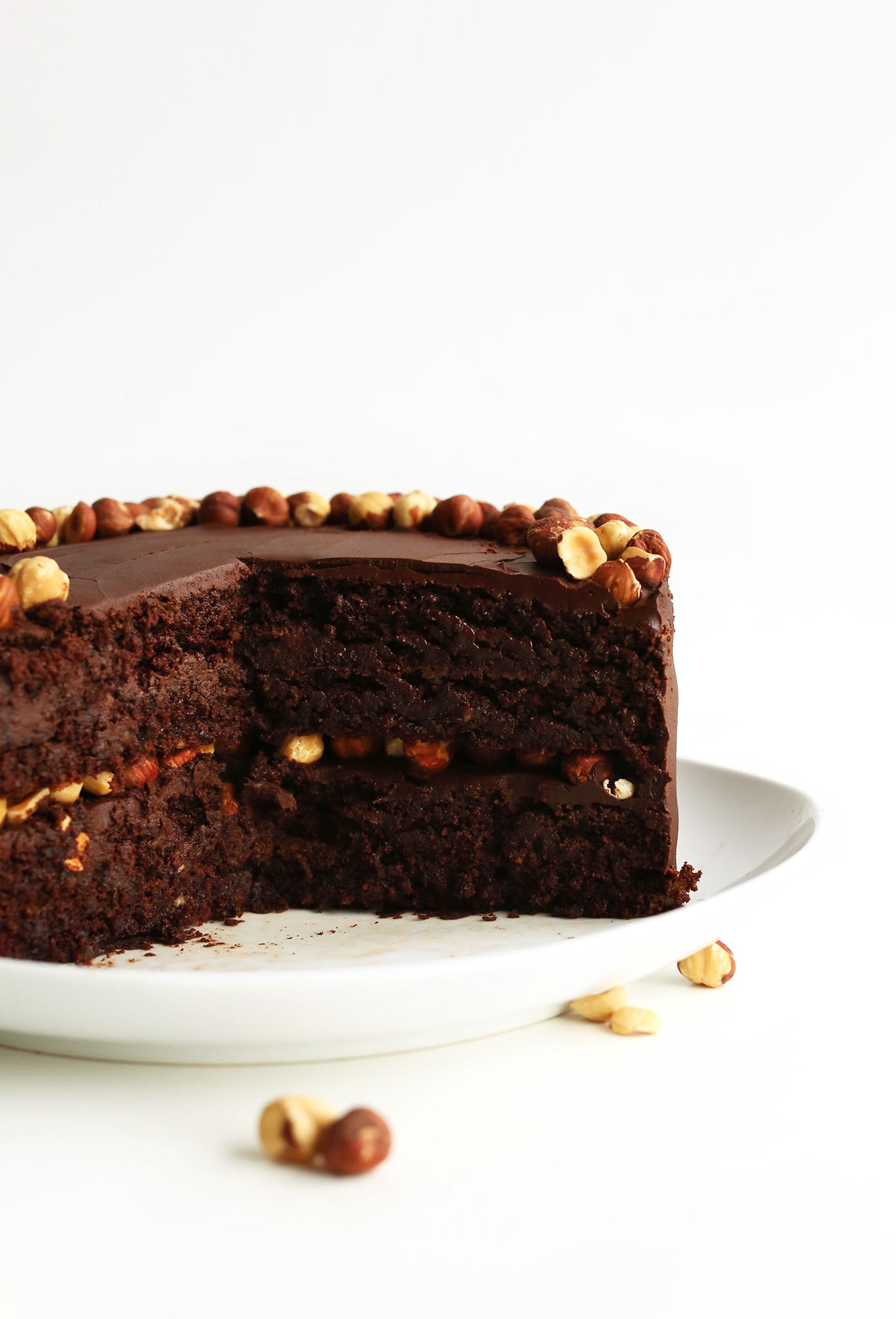 Layered delicious Vegan GF Chocolate Hazelnut Cake for a special dessert
