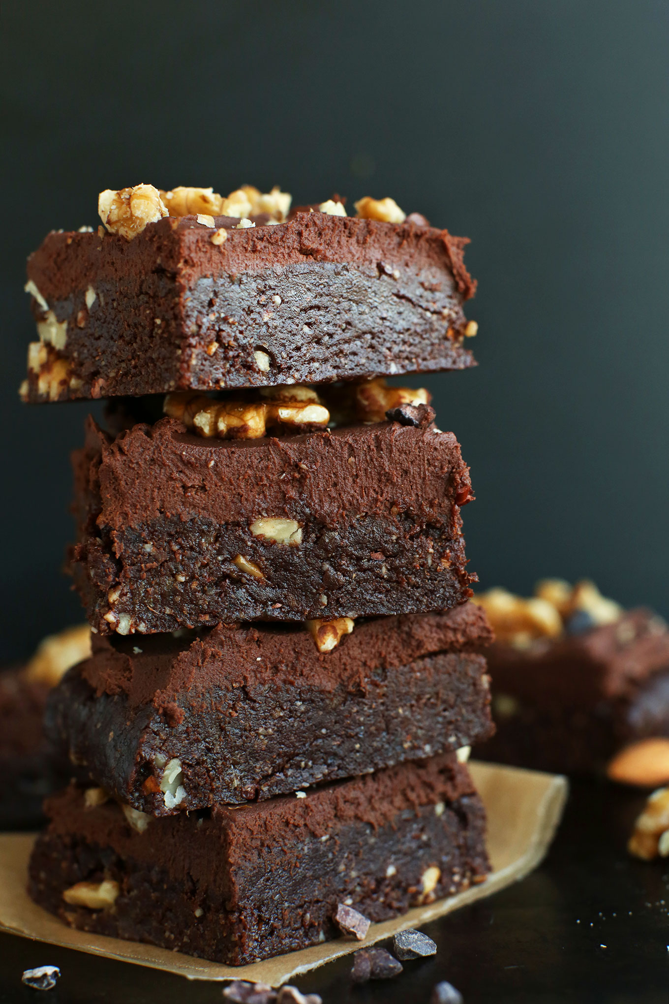 Stack of delicious Raw Vegan Brownies with Coconut Oil Chocolate Ganache Frosting