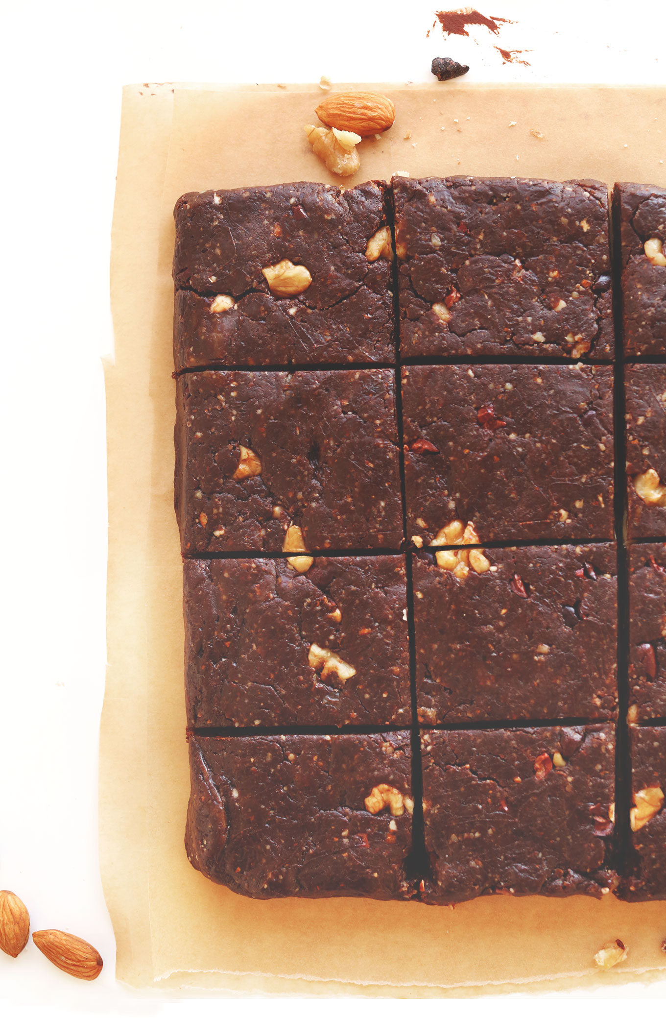No-Bake Vegan Brownies on a sheet of parchment paper