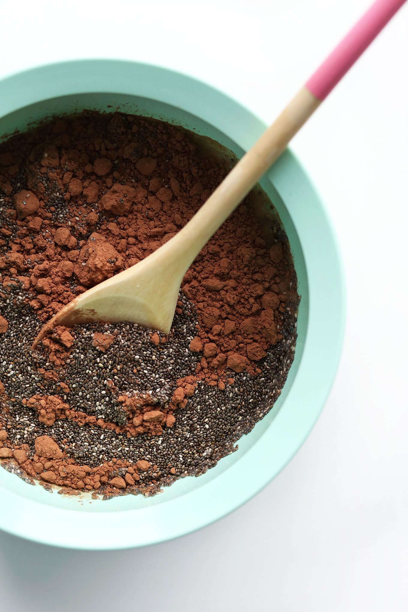 Stirring together ingredients for easy vegan Chocolate Chia Seed Pudding