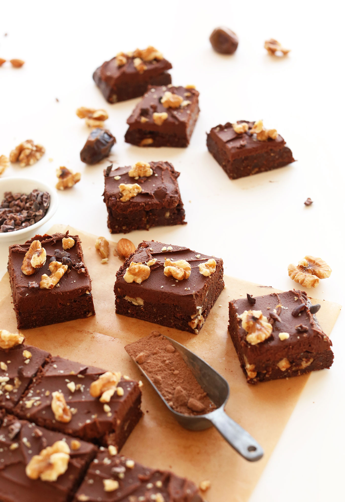 Squares of the Best Raw Vegan Brownies with Chocolate Ganache Frosting