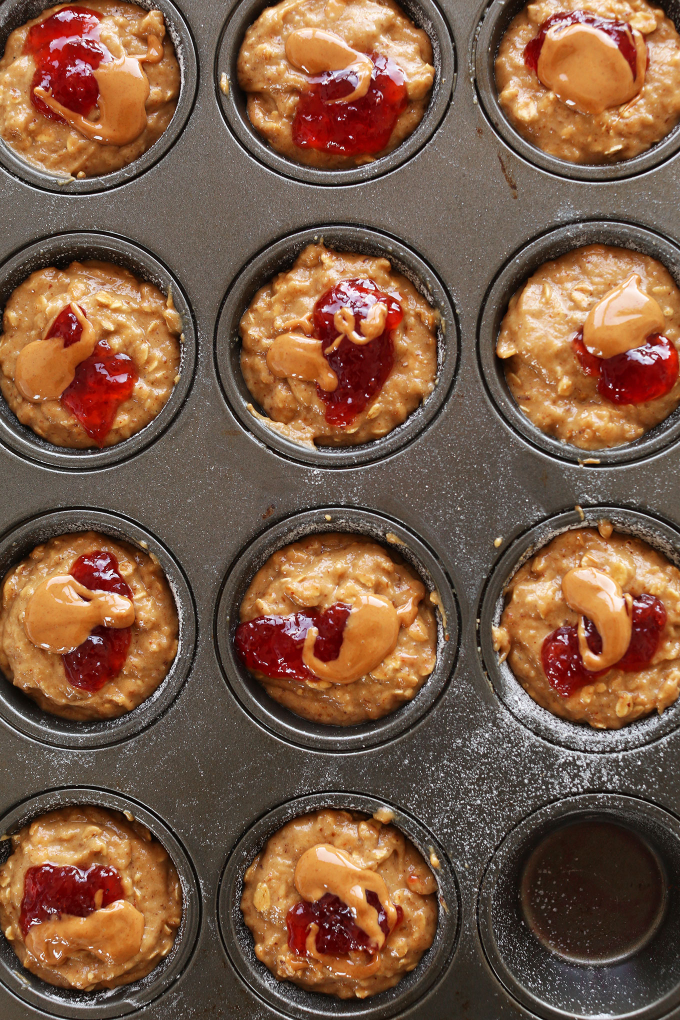 Muffin tin filled with our delicious PB&J Muffins recipe