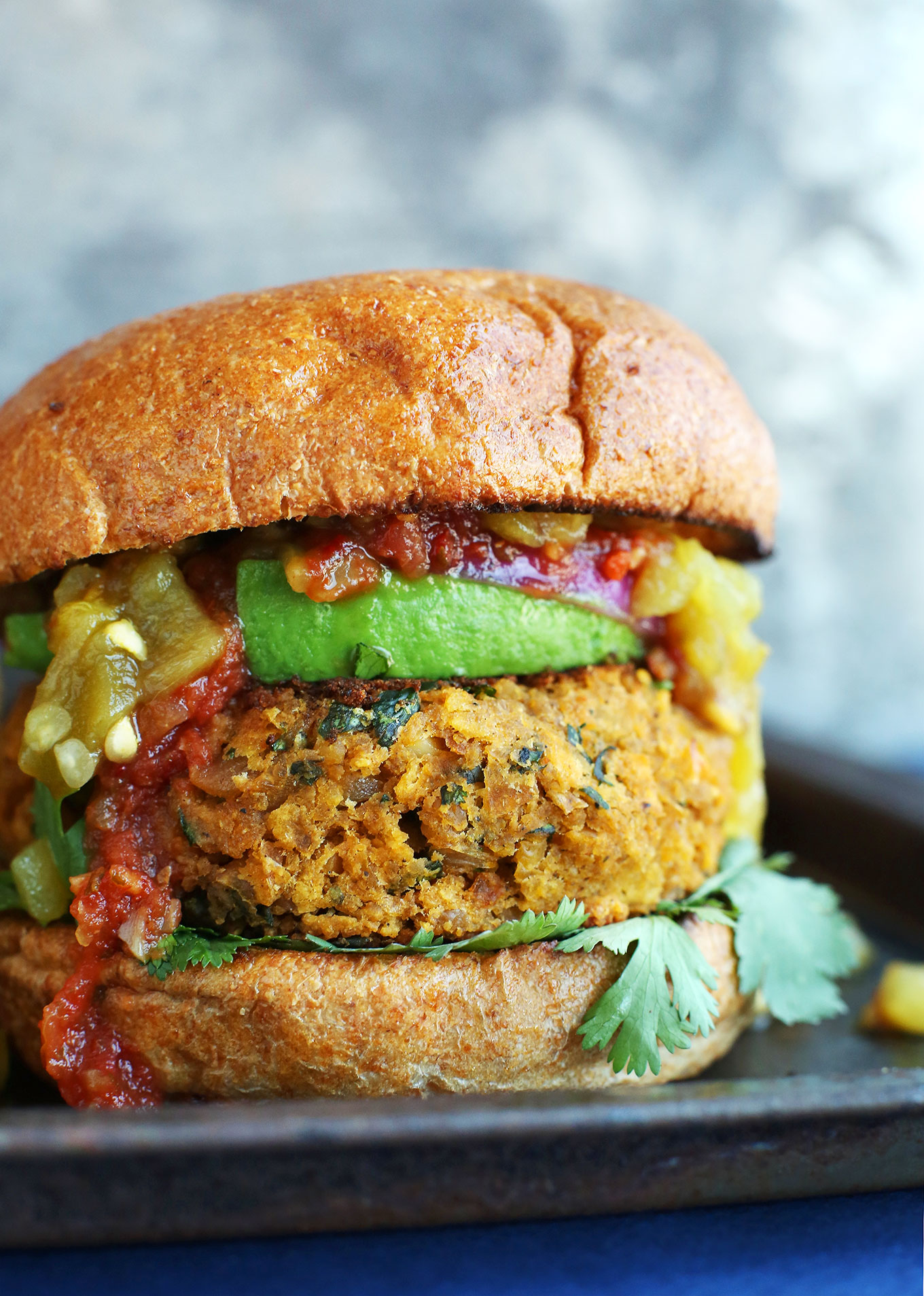 Close up shot of a protein-packed vegan Green Chili Mexican Veggie Burger