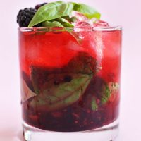 Glass filled with our Blackberry Basil Mojito recipe