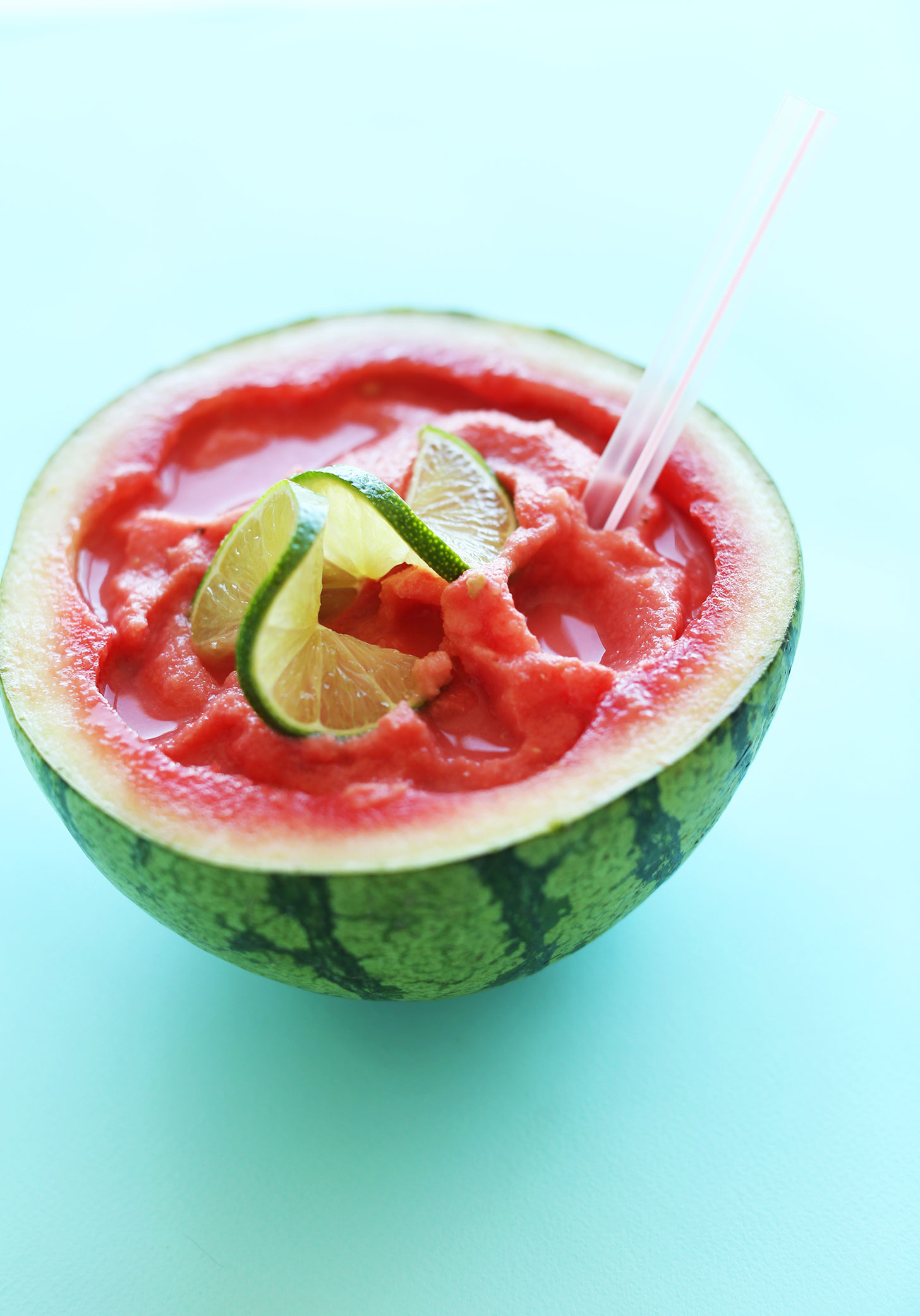 Halved watermelon filled with our refreshing Watermelon Slushie recipe