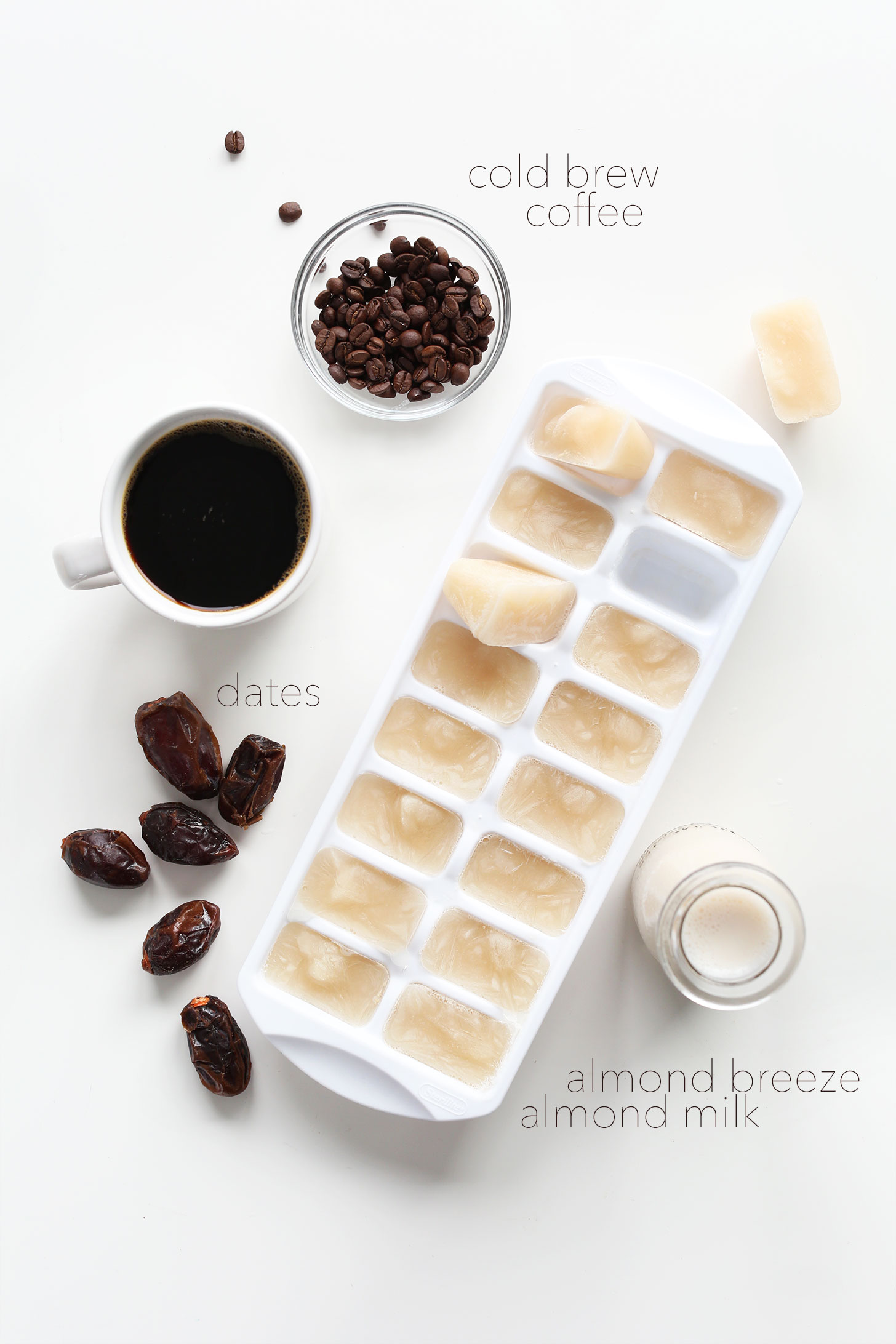 Almond milk ice cubes, dates, and coffee for making a vegan Caramel Frappuccino