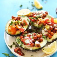 Plate of our Mediterranean-inspired Avocado Boats for a healthy vegan dinner recipe