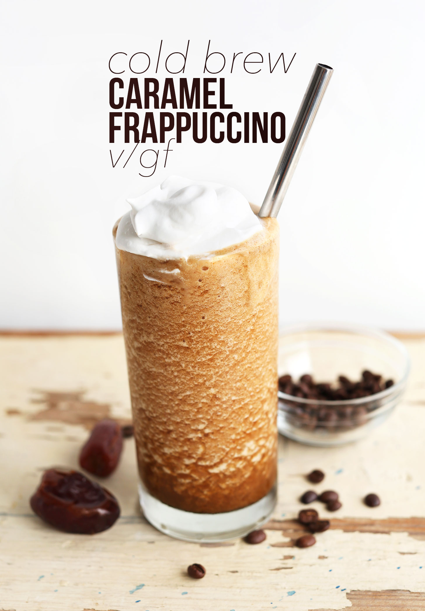 Large glass of our vegan cold brew Caramel Frappuccino topped with coconut whipped cream