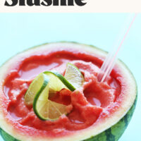 Slushie in a watermelon rind with lime slices on top and text above it reading Coconut Lime Watermelon Slushie just 3 ingredients