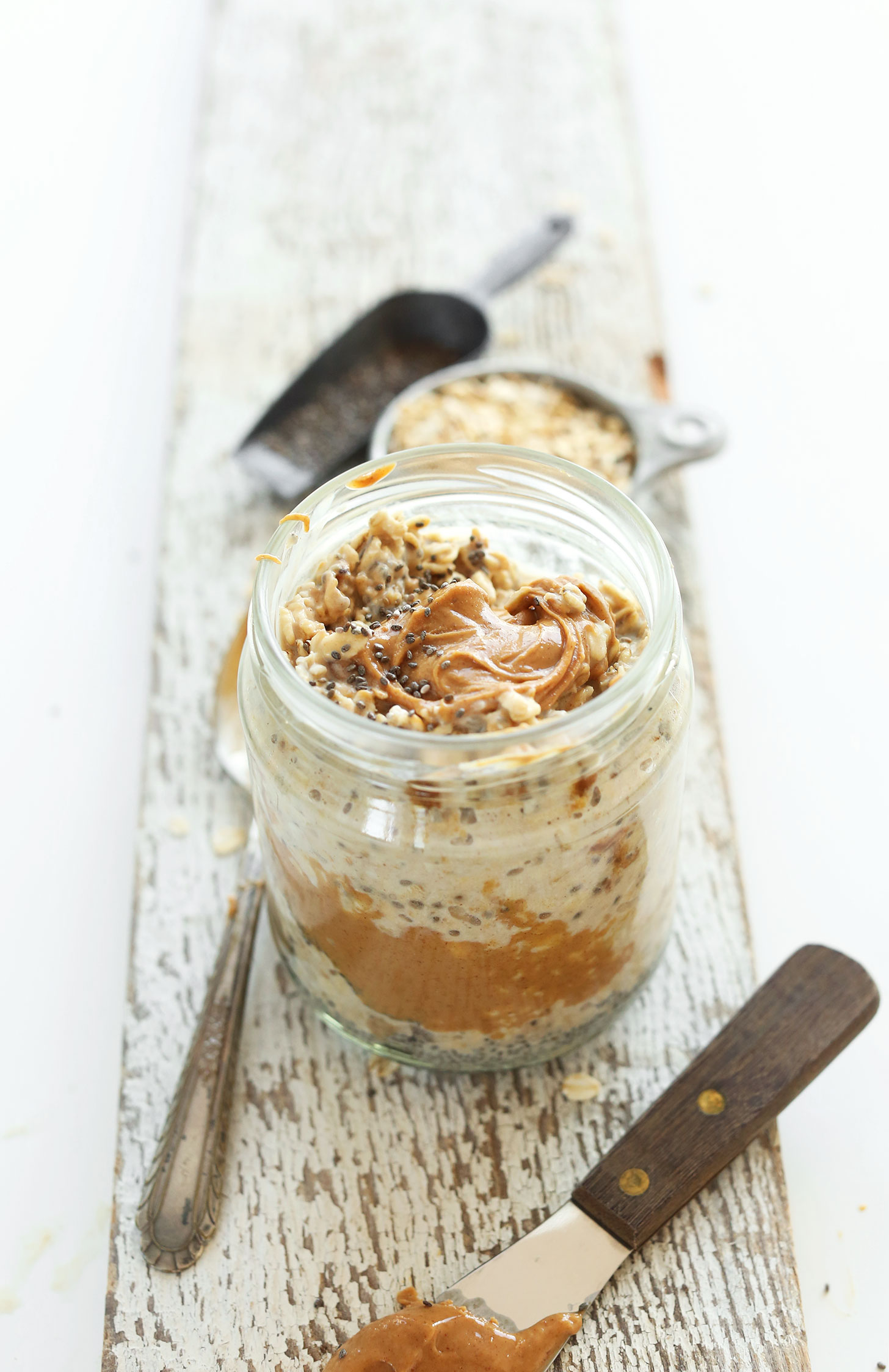 Jar of our simple and amazing vegan Peanut Butter Overnight Oats recipe