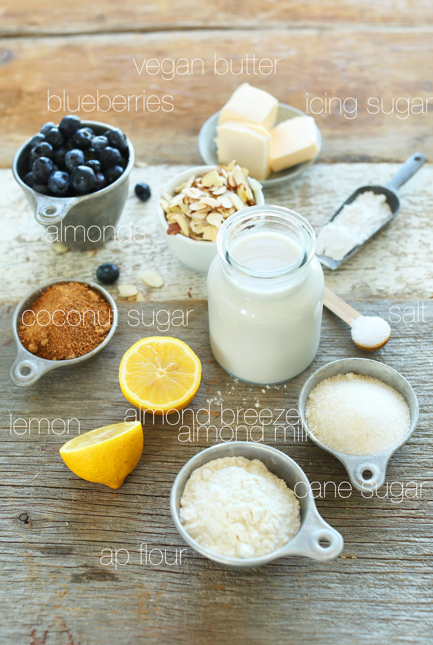 Blueberries, vegan butter, sugar, salt, almond milk, flour, lemon, and coconut sugar for making vegan Lemon Blueberry Pie Bars
