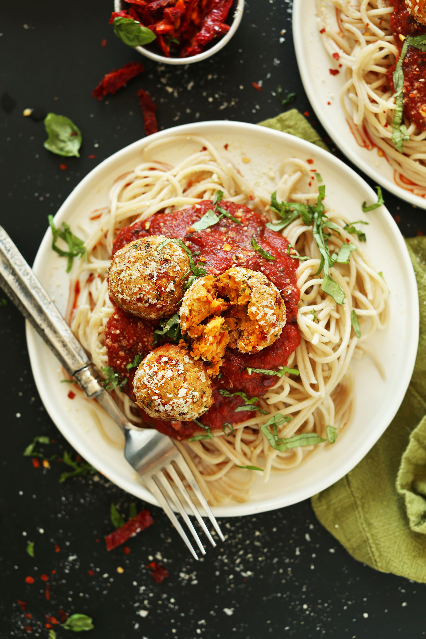 Delicious plant-based meal of spaghetti noodles, marinara, and our simple Vegan Chickpea Meatballs recipe