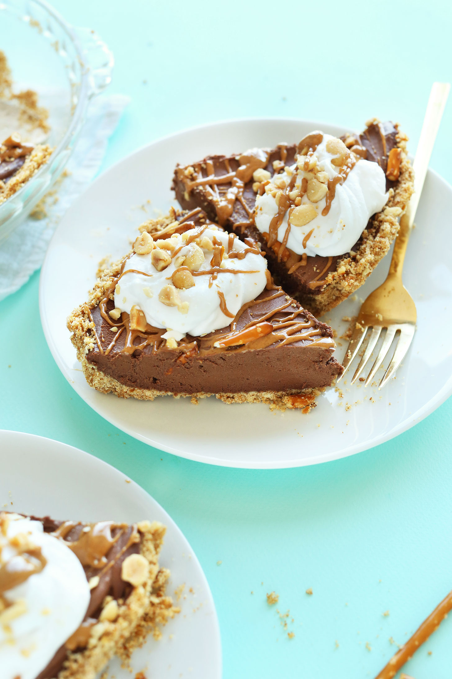 Plate with two slices of our amazing and simple Pretzel Peanut Butter Chocolate Pie