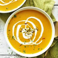 Bowl of our creamy flavorful Curried Butternut Squash Soup for a healthy vegan fall recipe