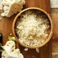 Close up shot of a bowl of cauliflower rice for our How to Make Cauliflower Rice Tutorial