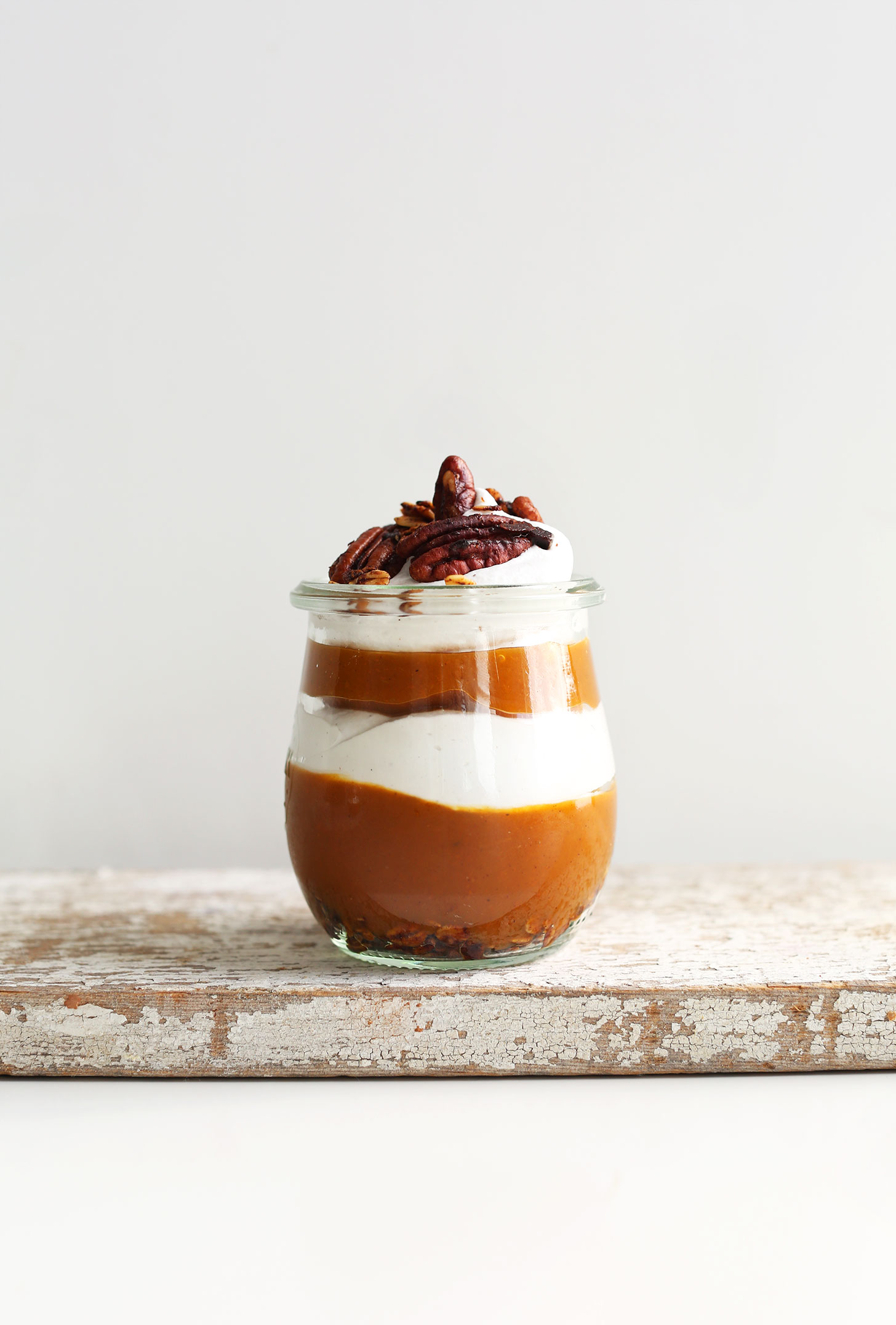 Jar of Pumpkin Pie Parfait for a delicious vegan Thanksgiving dessert
