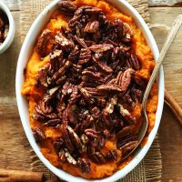 Pan of Sweet Potato Butternut Squash Mash topped with pecans