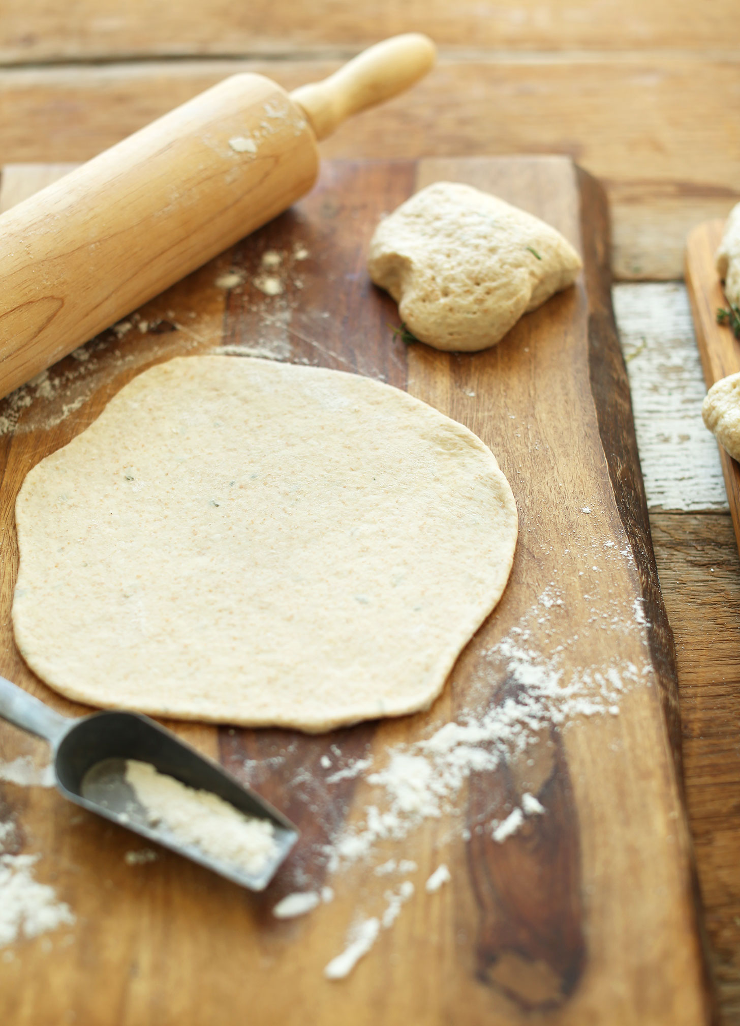 Rolling out vegan flatbread dough