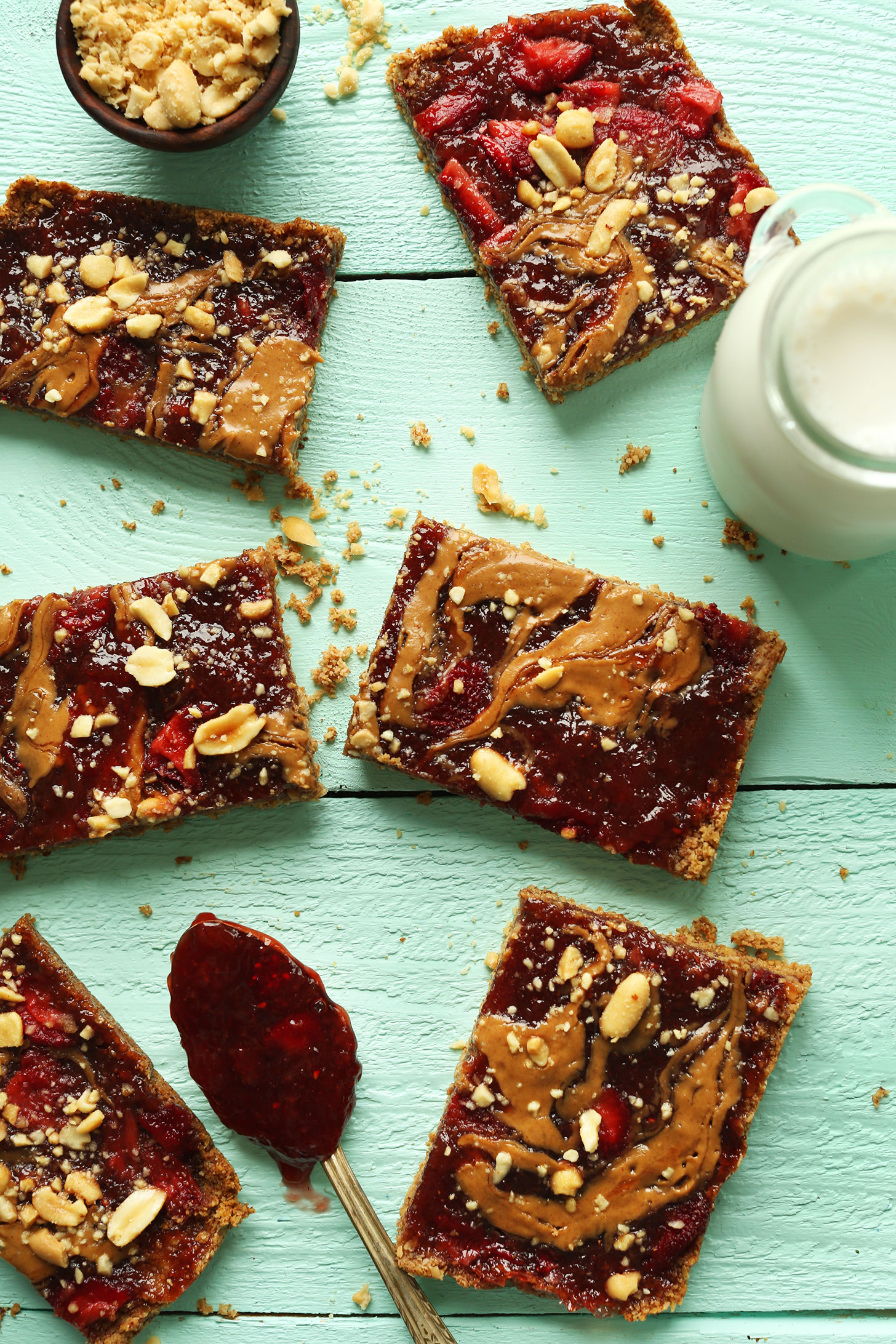 Squares of our simple healthy PB&J Oat Bars recipe