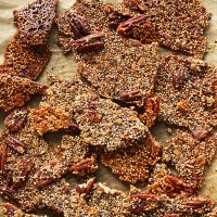 Baking sheet filled with pieces of Quinoa Brittle