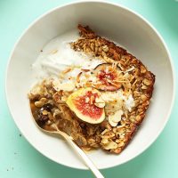 Bowl of Toasted Coconut Baked Oatmeal topped with fresh figs