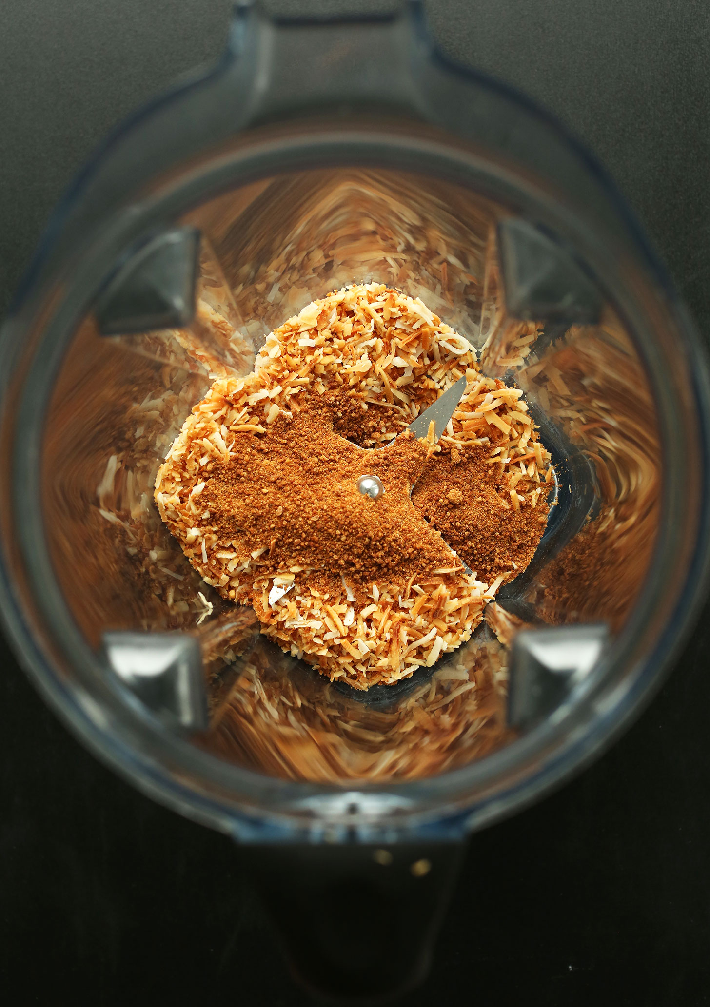 Blender with dry ingredients for our vegan Toasted Coconut Pancakes recipe