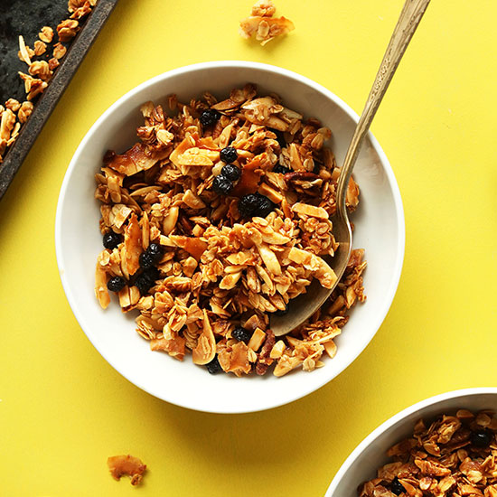 Bowls of Chunky Coconut Granola made with dried blueberries