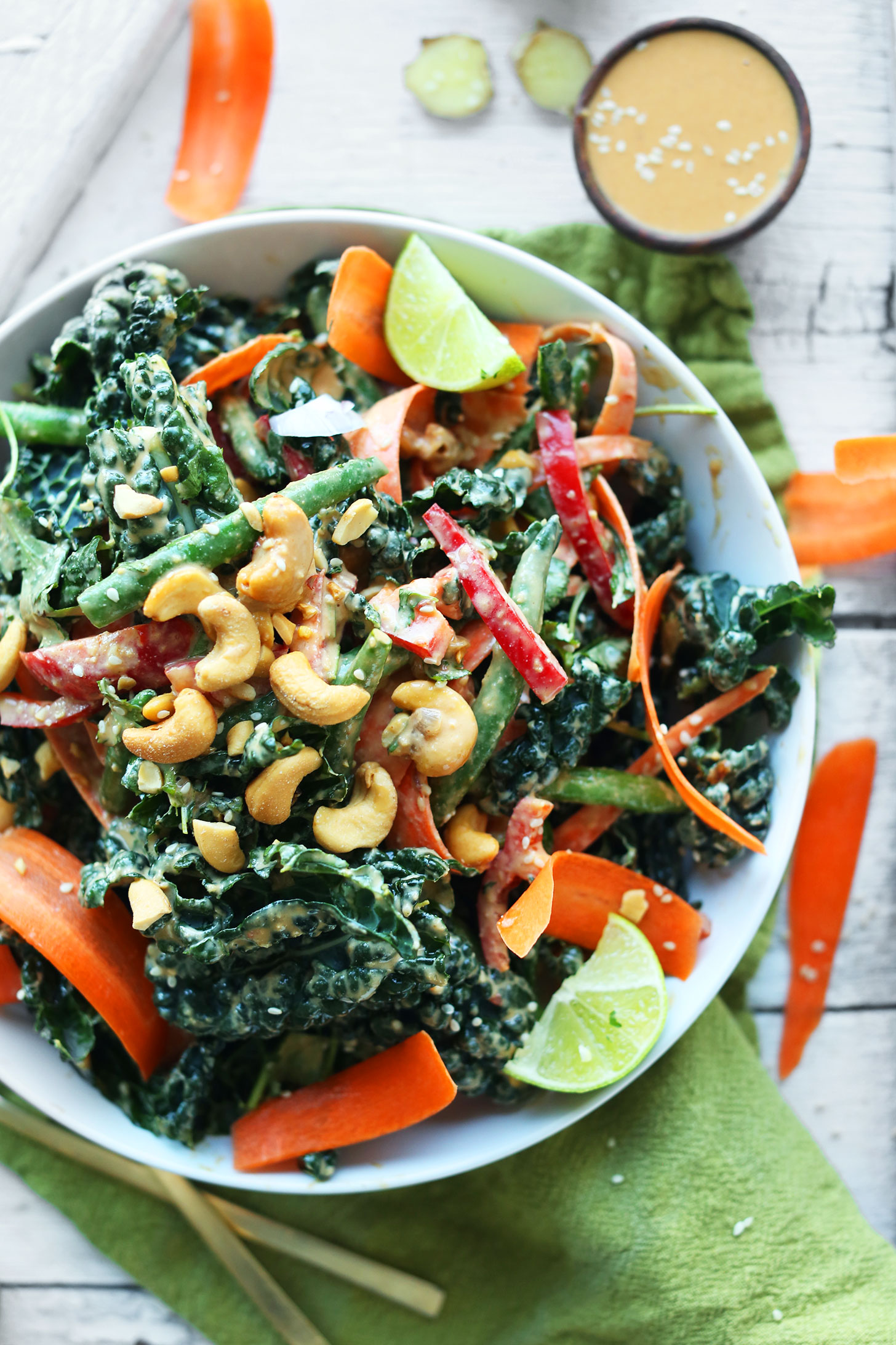 Bowl of Ginger Thai Kale Salad with Cashew Dressing for a healthy vegan meal