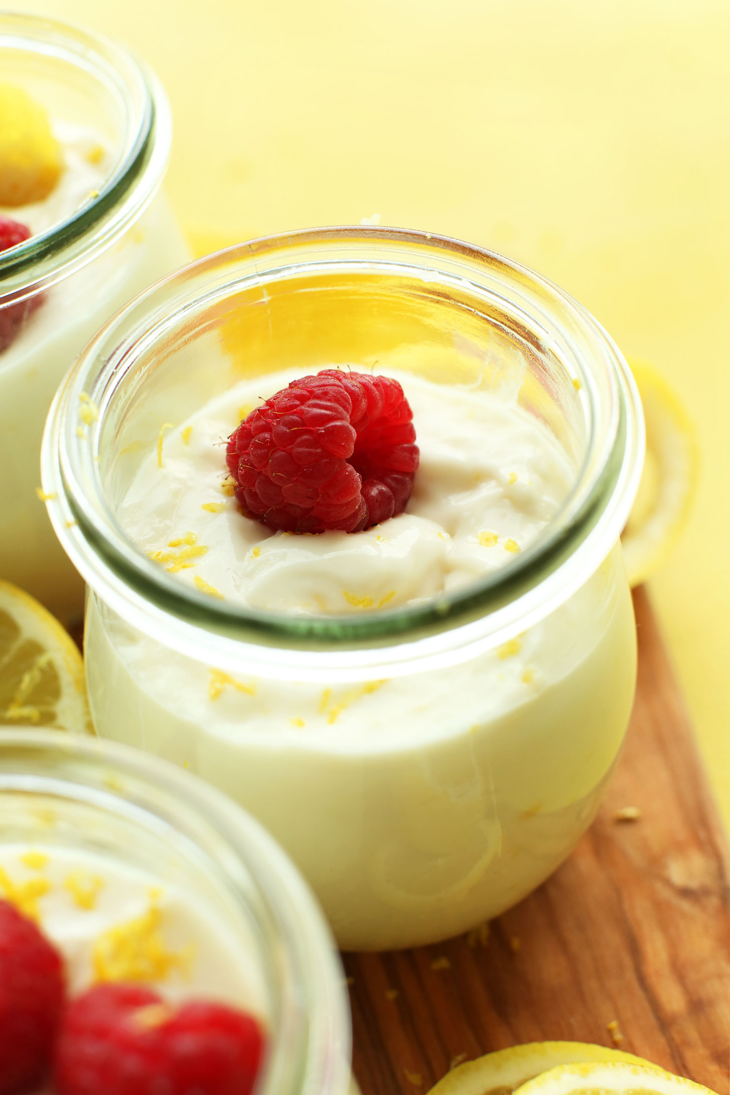 Jars of creamy vegan lemon curd for a refreshing dessert