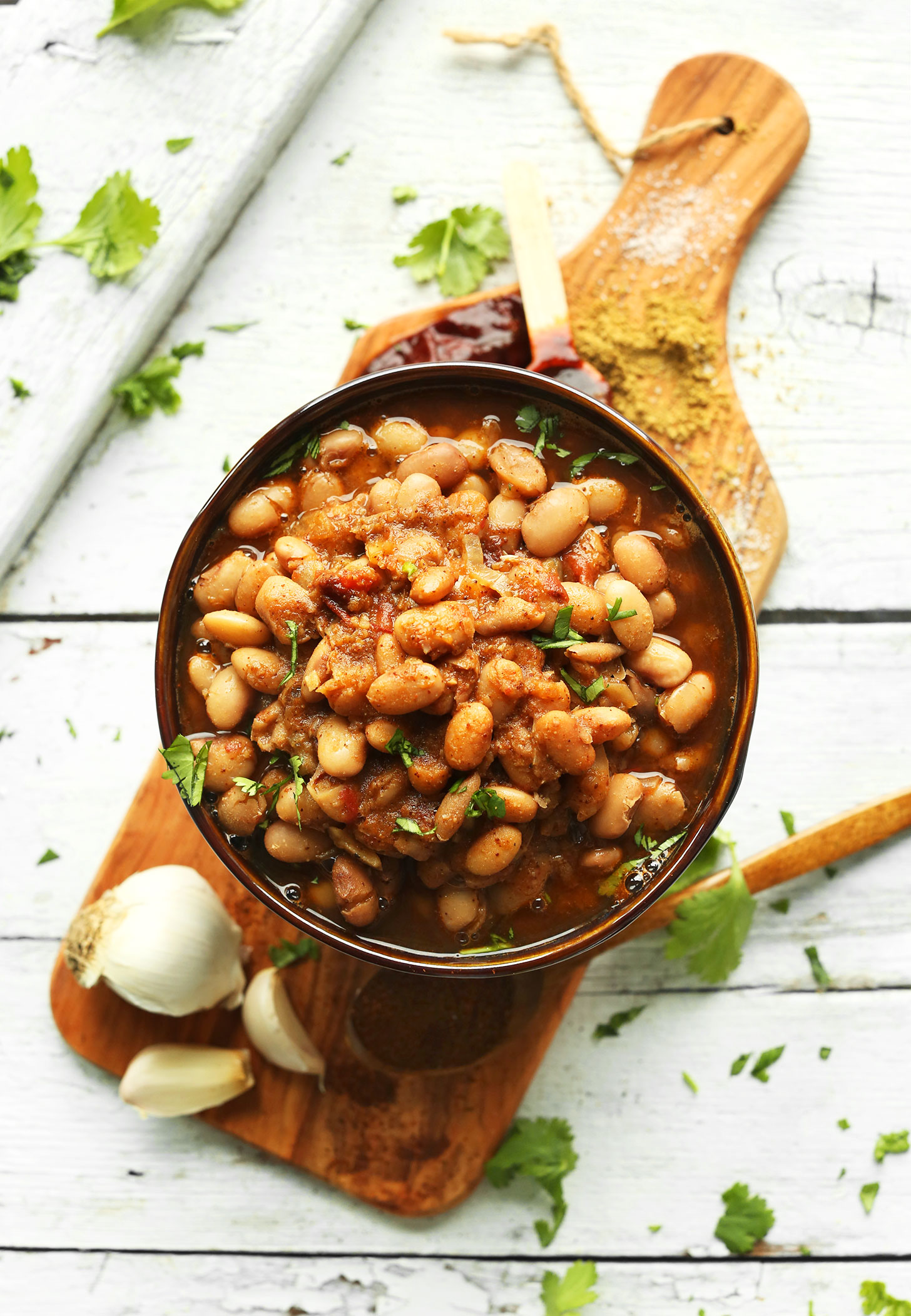Bowl of our delicious smoky Mexican Pinto Beans made with our tutorial for How To Make Pinto Beans from Scratch