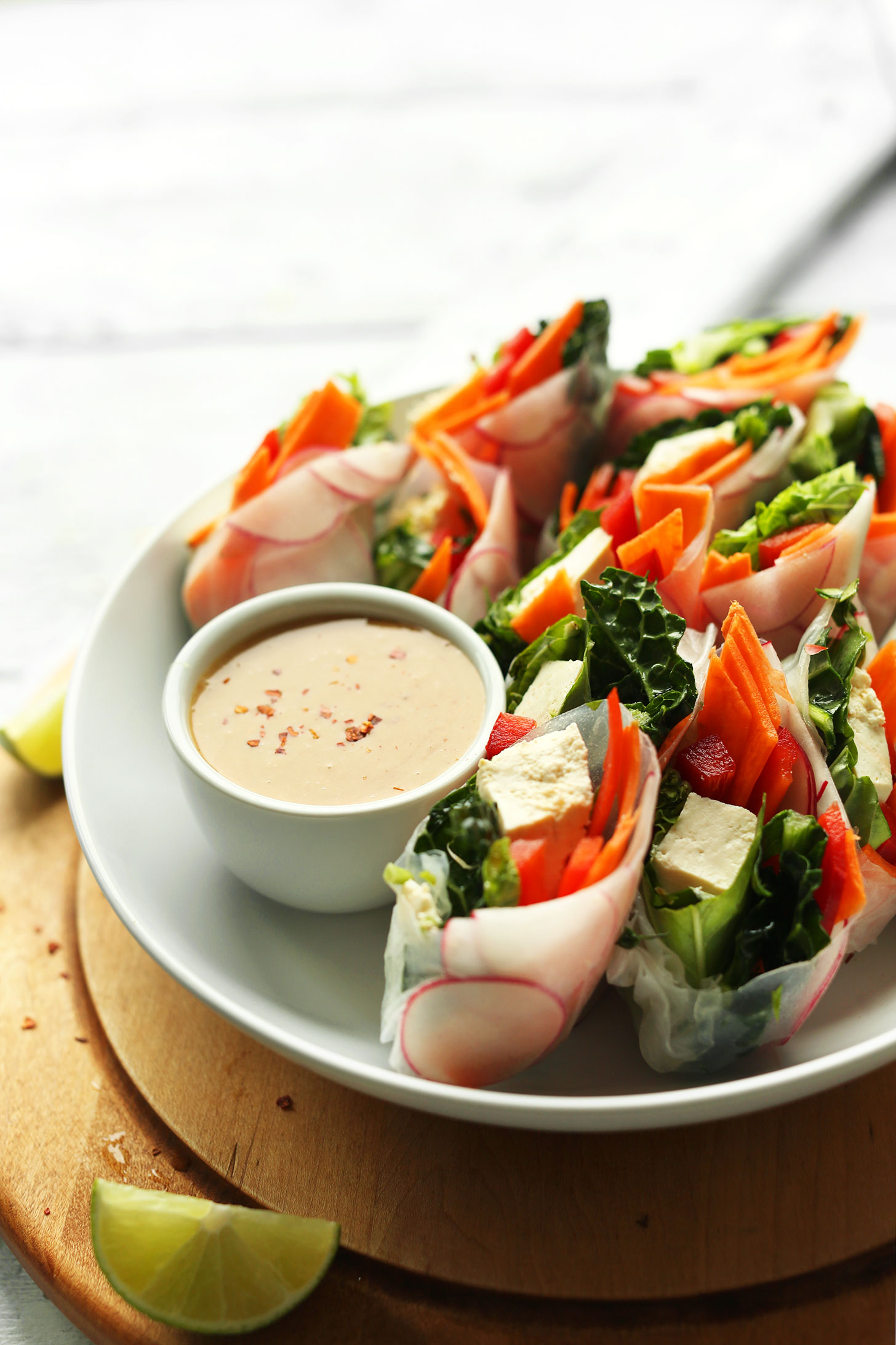 Bowl full of our gluten-free vegan tofu salad rolls recipe with Cashew Dipping Sauce