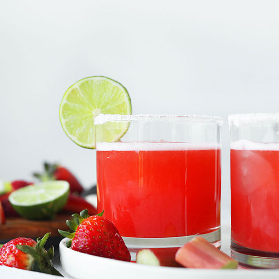 Two glasses of our Strawberry Rhubarb Margarita recipe