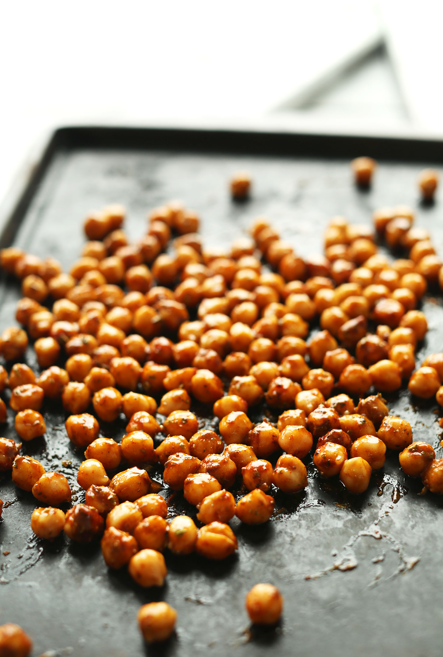 Baking sheet filled with spiced chickpeas for Chickpea Shawarma Dip