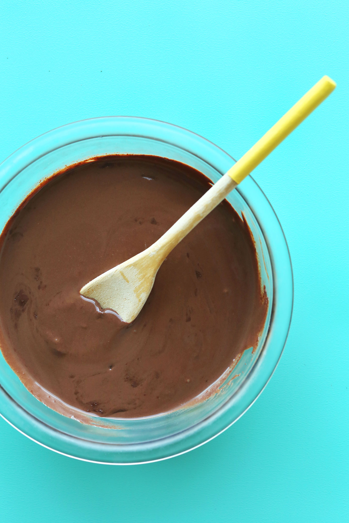 Stirring together rich chocolatey creamy mixture for our vegan chocolate ice cream recipe