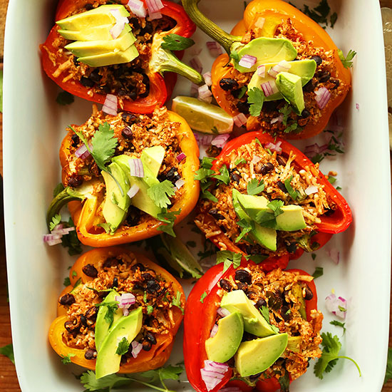 Baking pan filled with Cauliflower Rice Stuffed Peppers