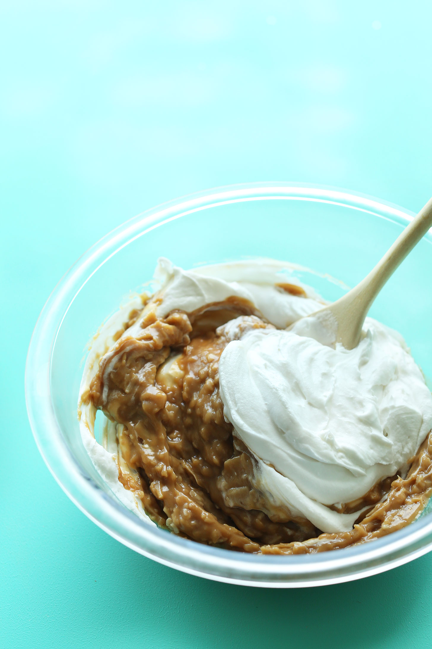 Stirring together ingredients for our gluten-free vegan Coconut Cream Pie recipe