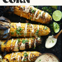 Grilled corn on the cob with limes, cilantro, and a vegan cashew aioli