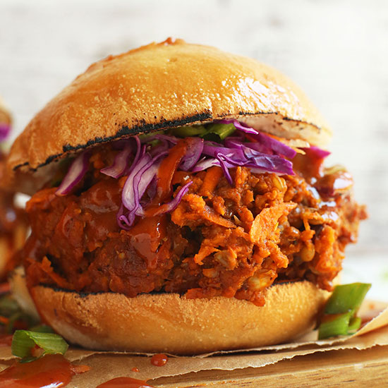 Hamburger filled with cabbage, green onion, and our Vegan 'Pulled Pork' recipe