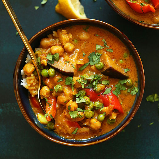 Bowl of our delicious veggie-packed Red Coconut Curry with Chickpeas