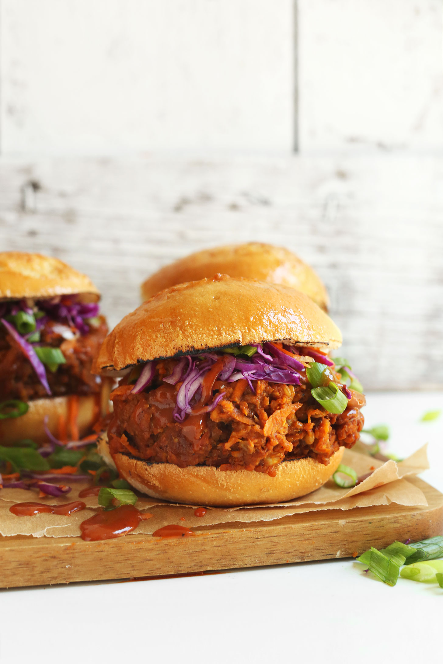 Cutting board filled with Vegan Pulled Pork Sandwiches for a delicious vegan BBQ recipe