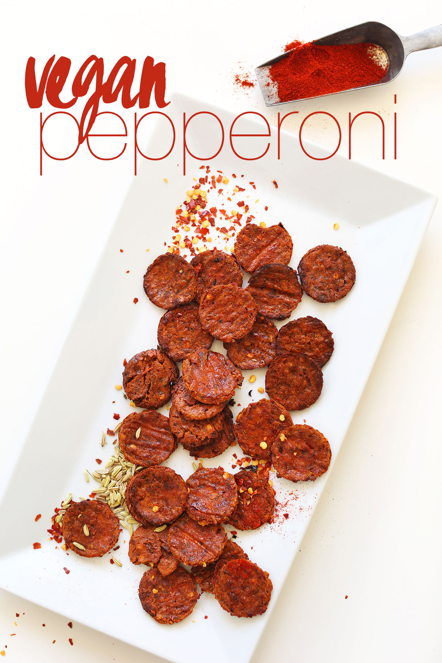 Ceramic platter with slices of vegan pepperoni for making homemade pizza