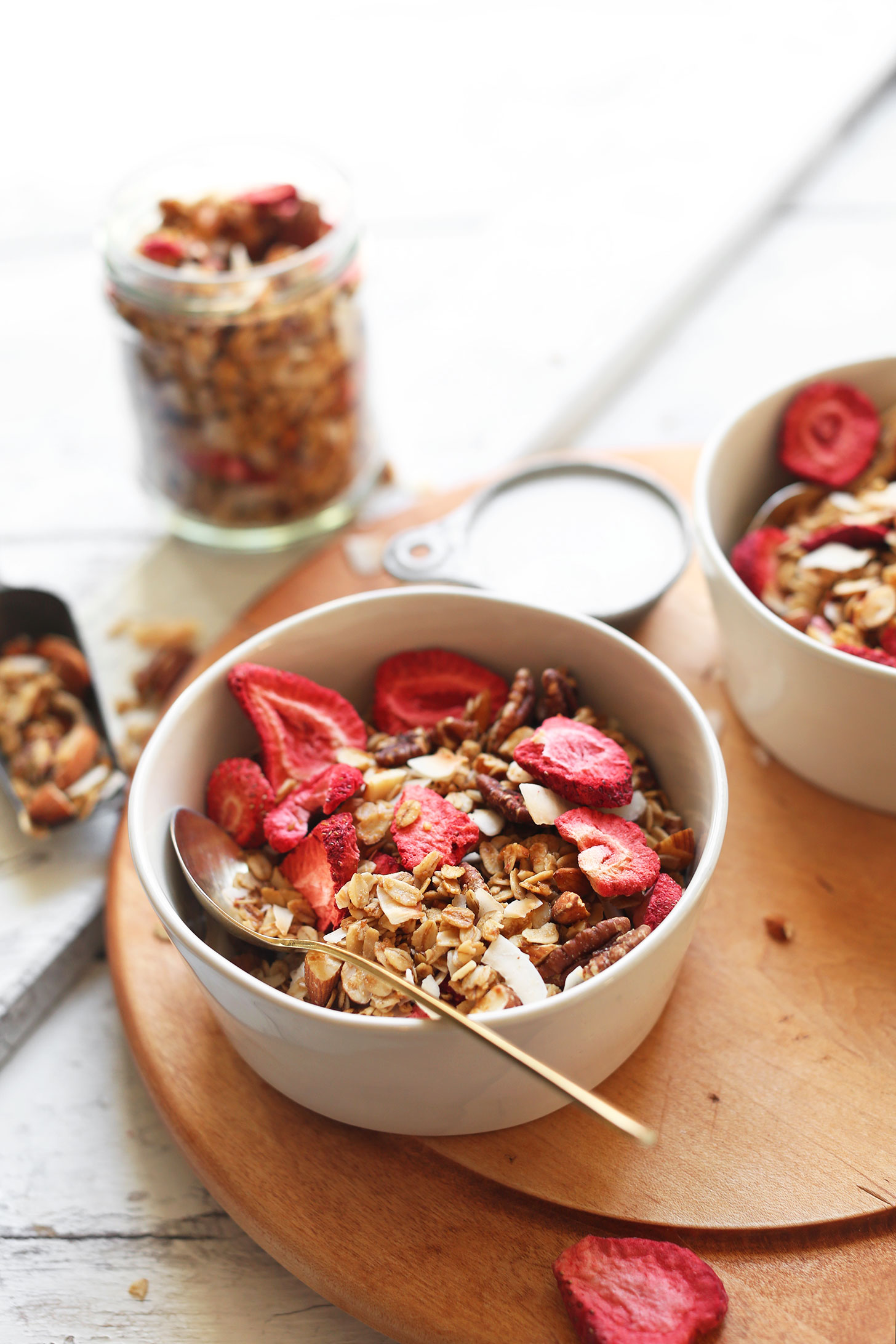 Bowl of our homemade Easy Coconut Strawberry Granola that is gluten-free and vegan