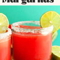 Watermelon margaritas with salted rims and lime slices
