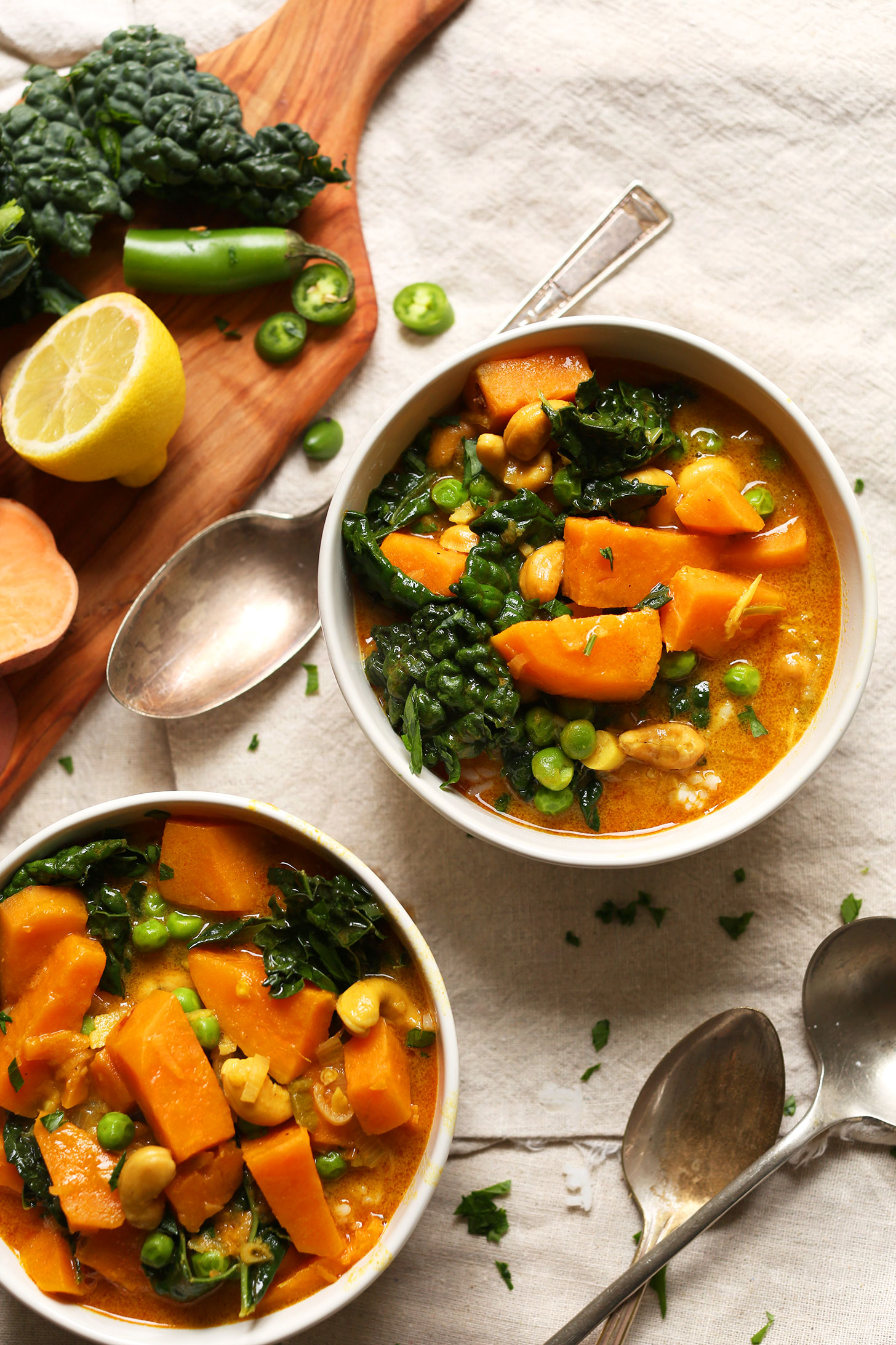Two bowls of our delicious protein-rich vegan Sweet Potato Kale Curry