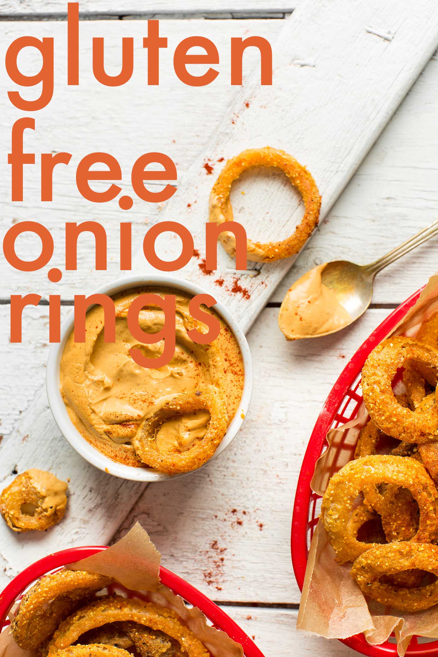 Containers of gluten-free onion rings with Vegan Chipotle Aioli