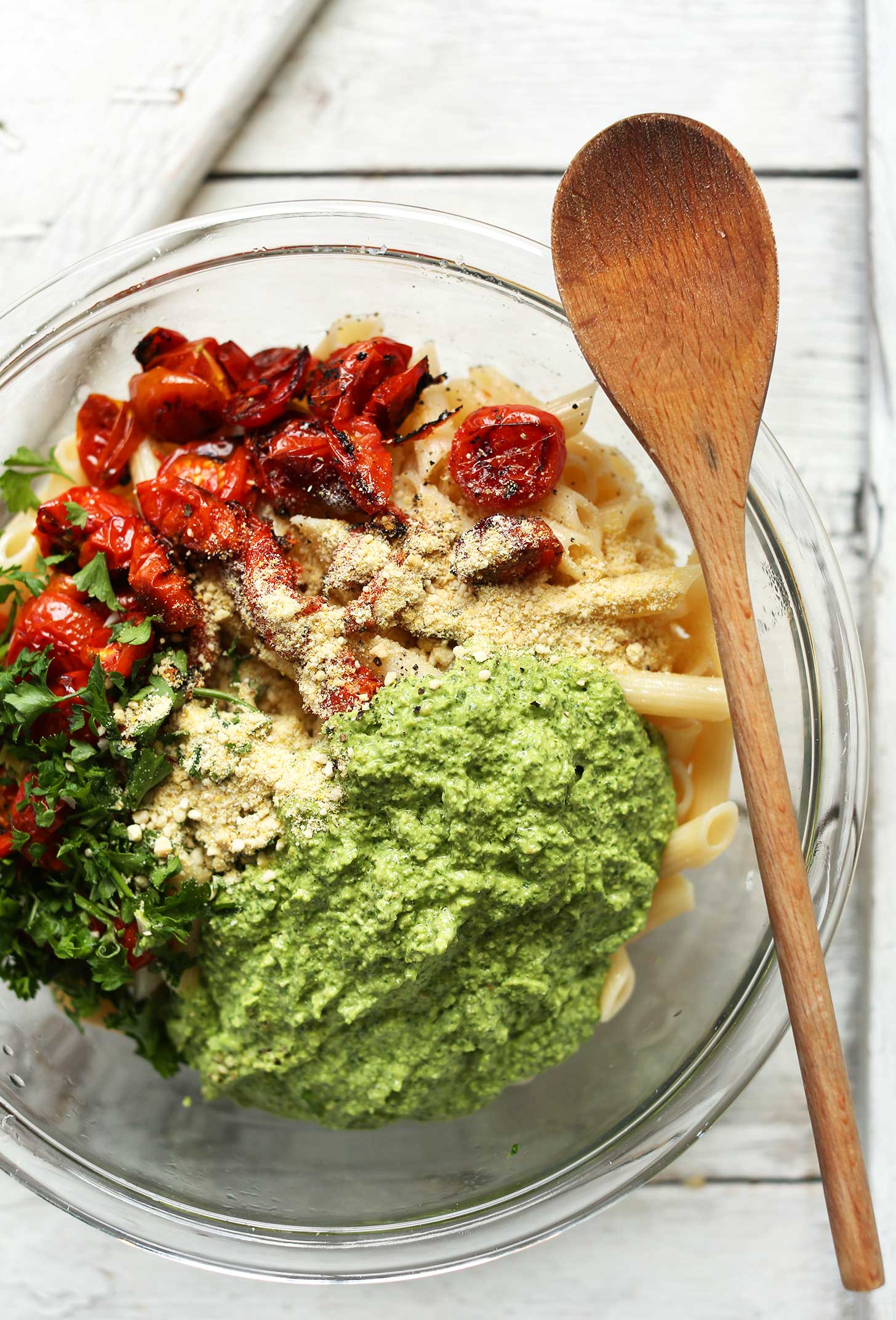 Mixing bowl with penne pasta salad for a gluten-free vegan meal