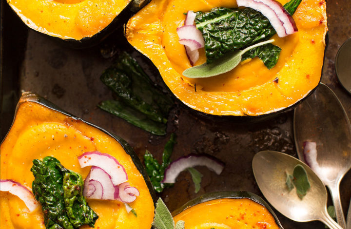 Delicious and comforting Acorn Squash Soup served in acorn squash bowls