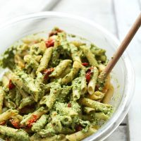 Bowl of gluten-free vegan pesto penne salad for an easy weeknight meal
